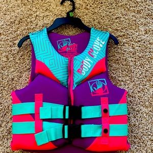 Kids Body Glove life jacket. Purple teal pink size 50-90lbs.